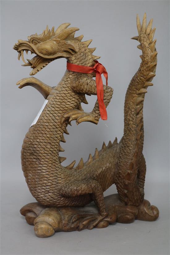 A 20th century carved wood Chinese dragon width 24cm height 36cm